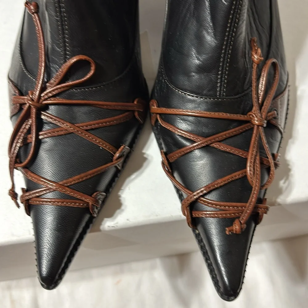 Elegant Black Ankle Boots with Brown Accents - Picture 3 of 13